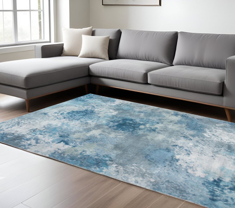 8' X 10' Blue And Ivory Abstract Area Rug