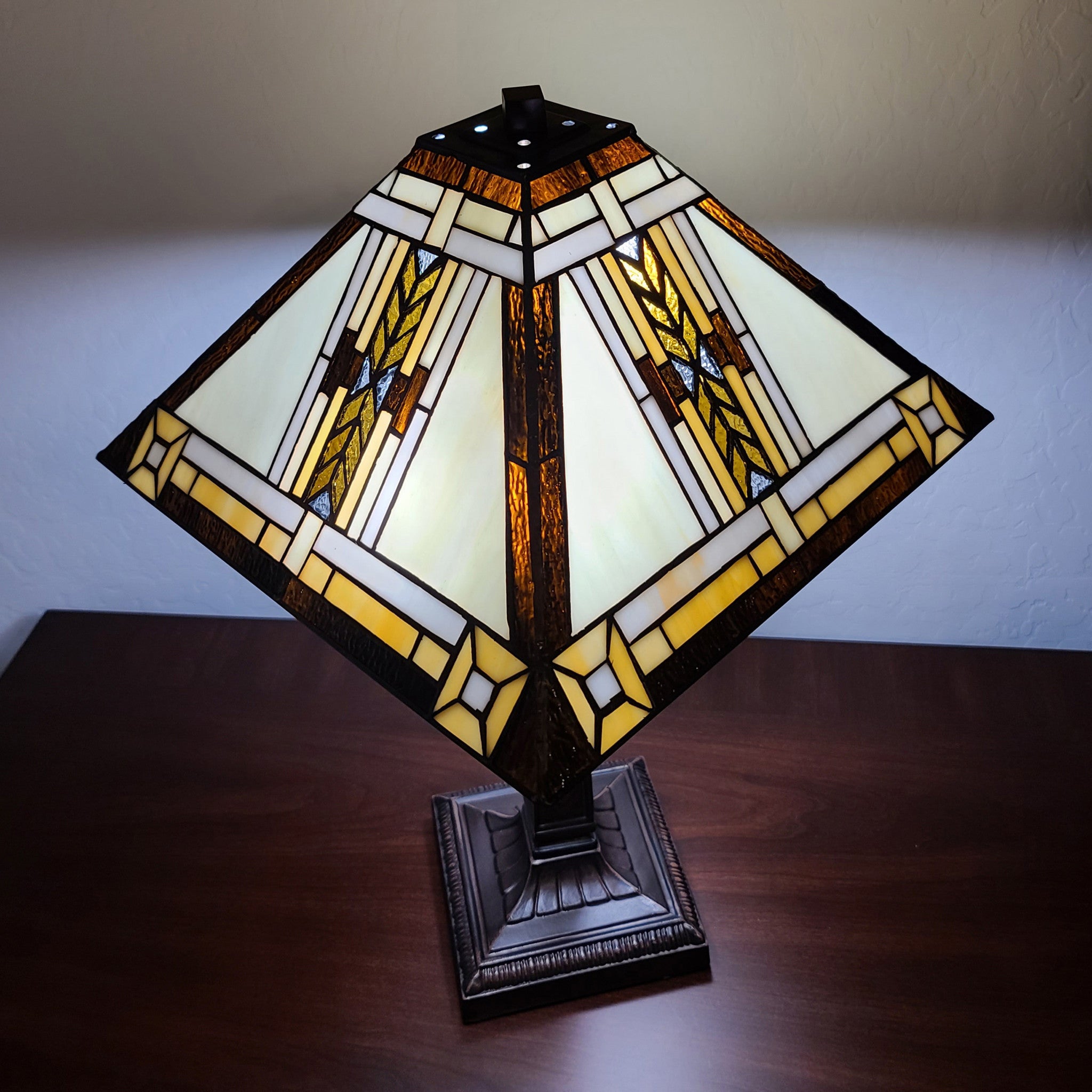 22" Dark Brown Metal Two Light Candlestick Table Lamp With Beige Shade
