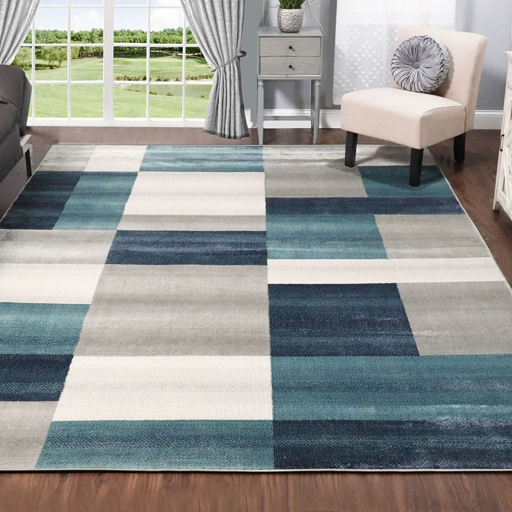 5' X 8' Teal And Ivory Patchwork Area Rug