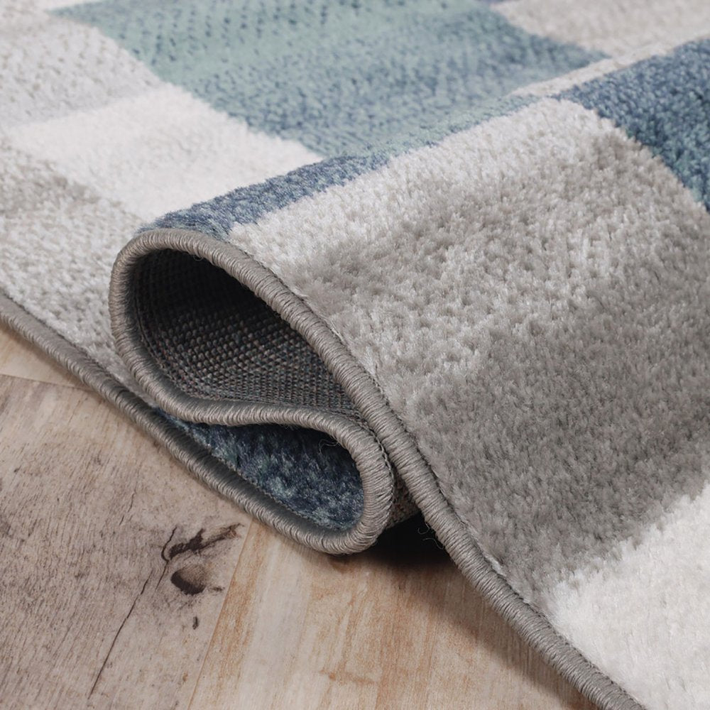 5' X 8' Teal And Ivory Patchwork Area Rug