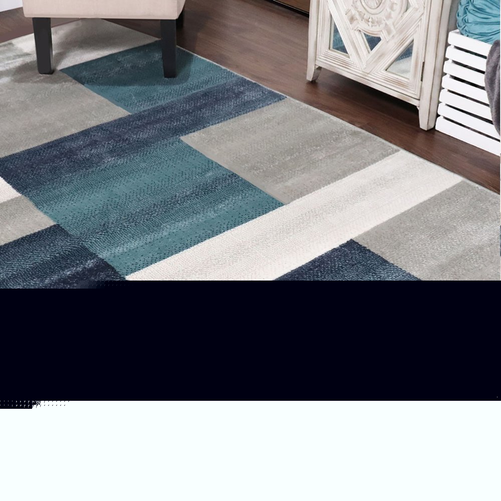5' X 8' Teal And Ivory Patchwork Area Rug