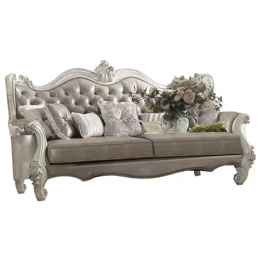 90" Gray Faux Leather Curved Sofa And Toss Pillows With Bone Legs