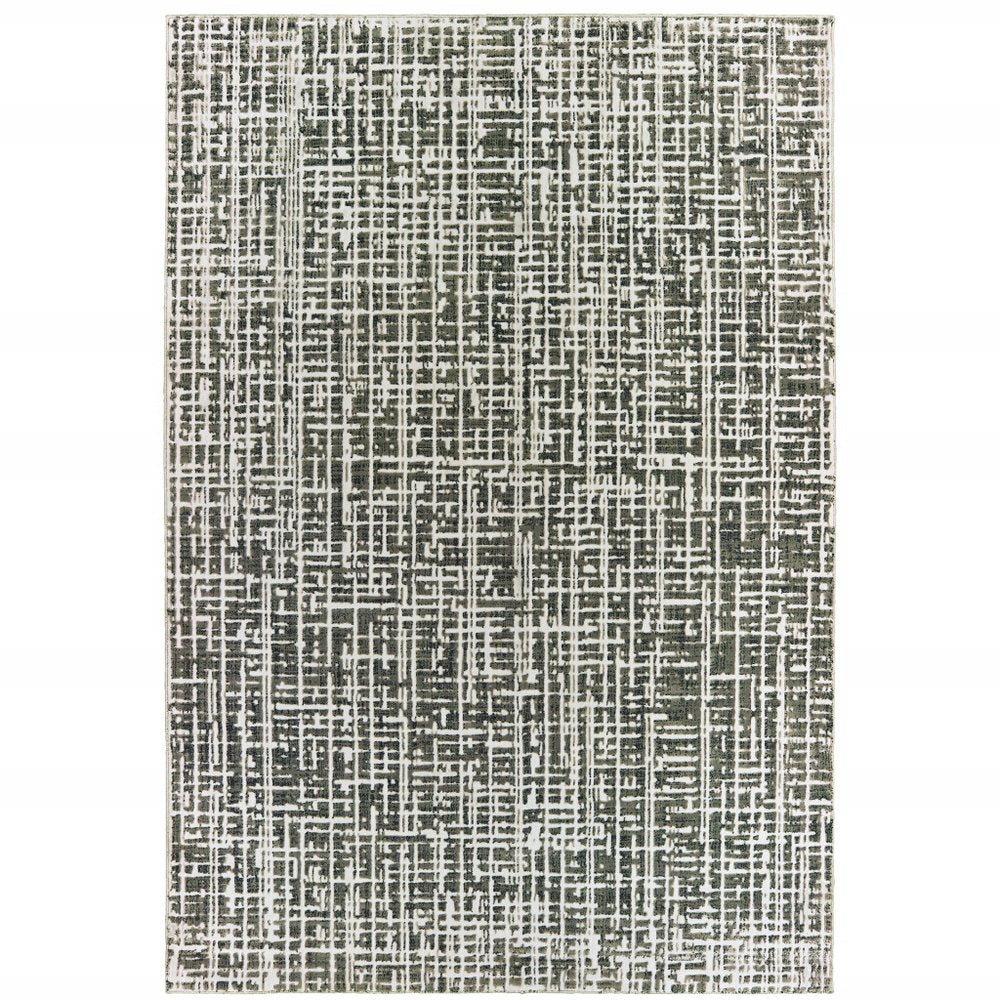 4' X 6' Grey And Ivory Abstract Power Loom Stain Resistant Area Rug