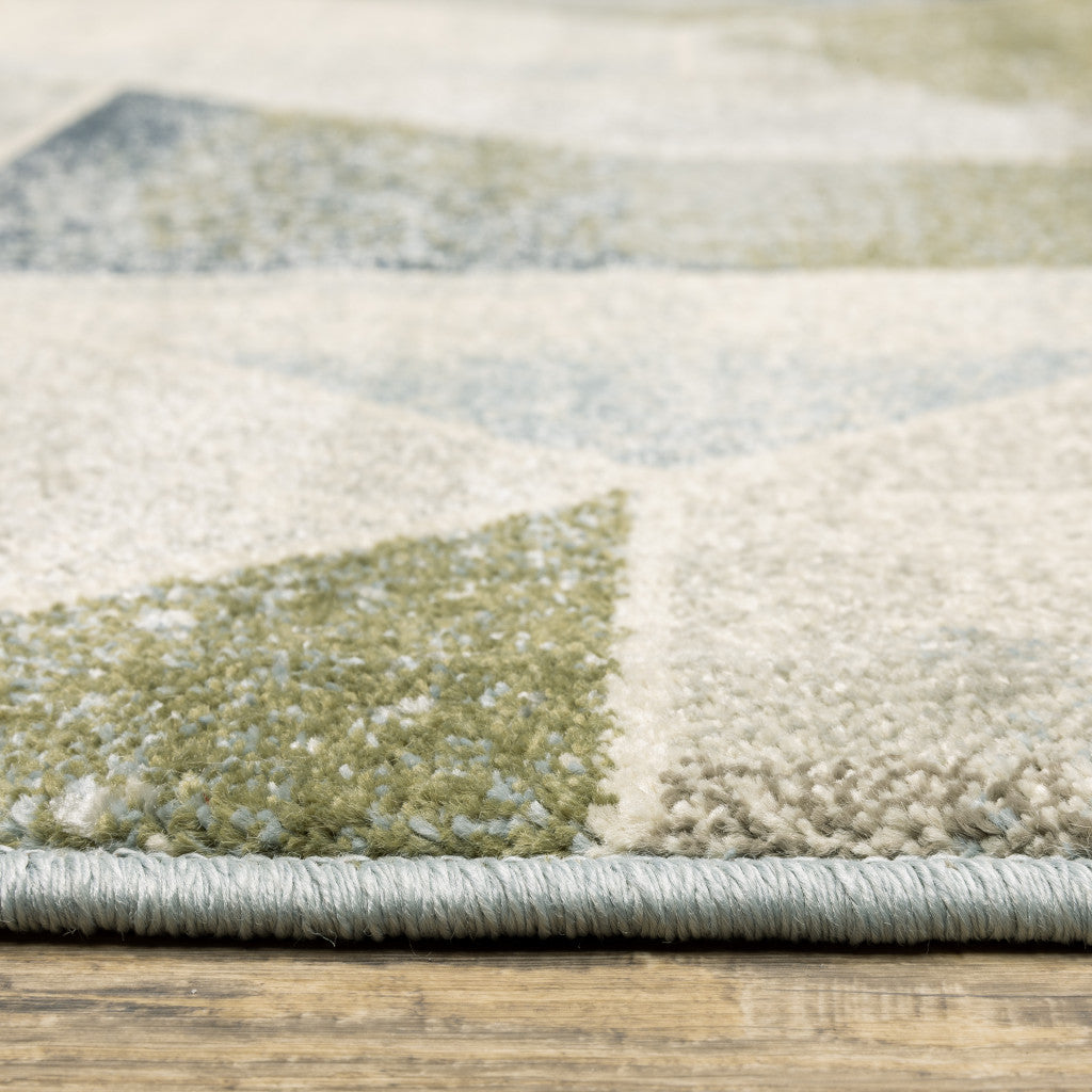 7' X 9' Gray And Ivory Geometric Area Rug
