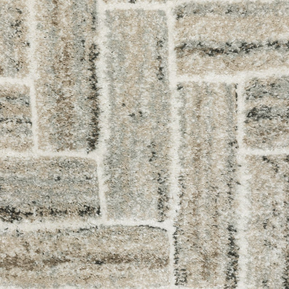 10' X 13' Ivory Beige Grey Brown Pale Blue And Charcoal Geometric Power Loom Stain Resistant Area Rug