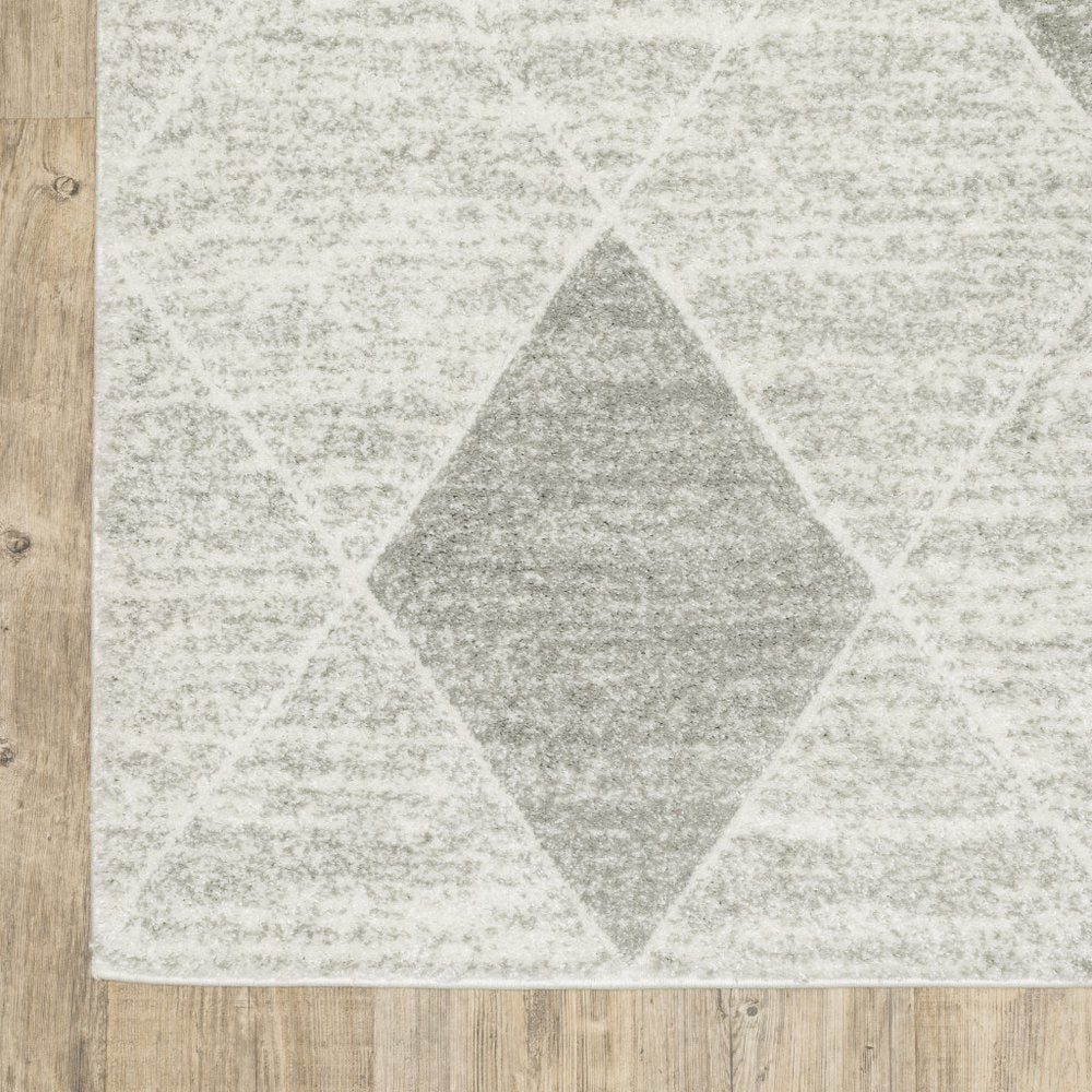 8' X 11' Gray And Ivory Geometric Area Rug