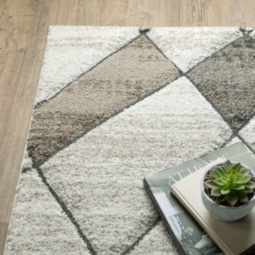 7' X 10' Beige And Gray Geometric Area Rug