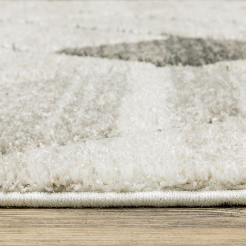 7' X 10' Beige And Gray Geometric Area Rug