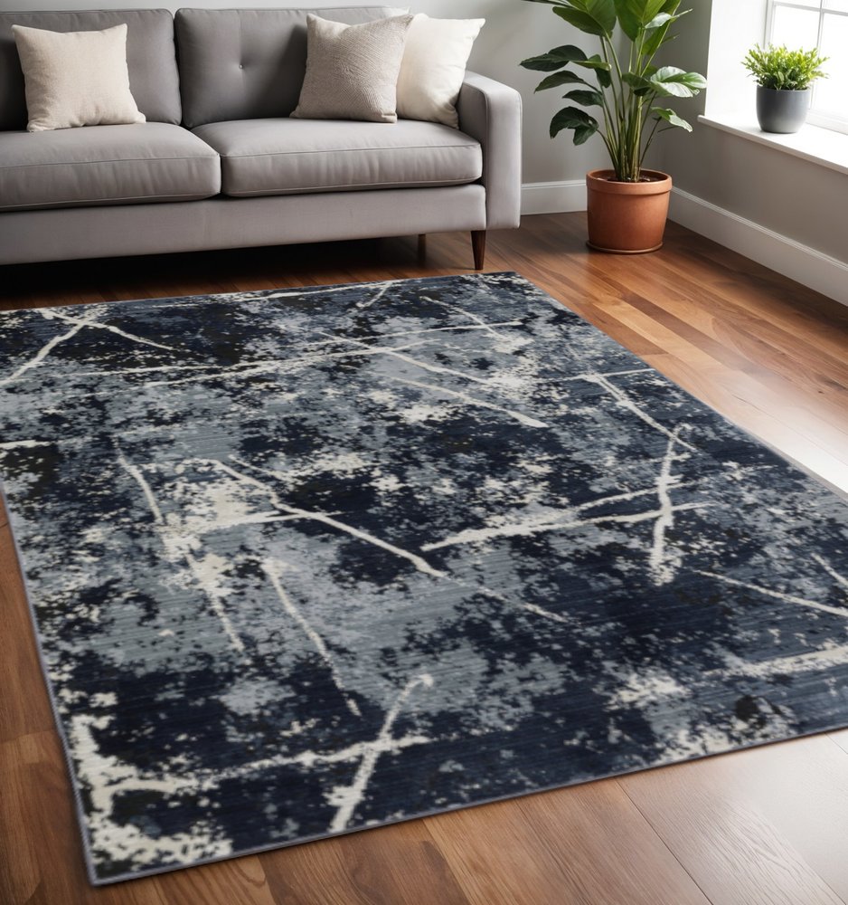 5' X 8' Blue Grey And Beige Abstract Power Loom Stain Resistant Area Rug