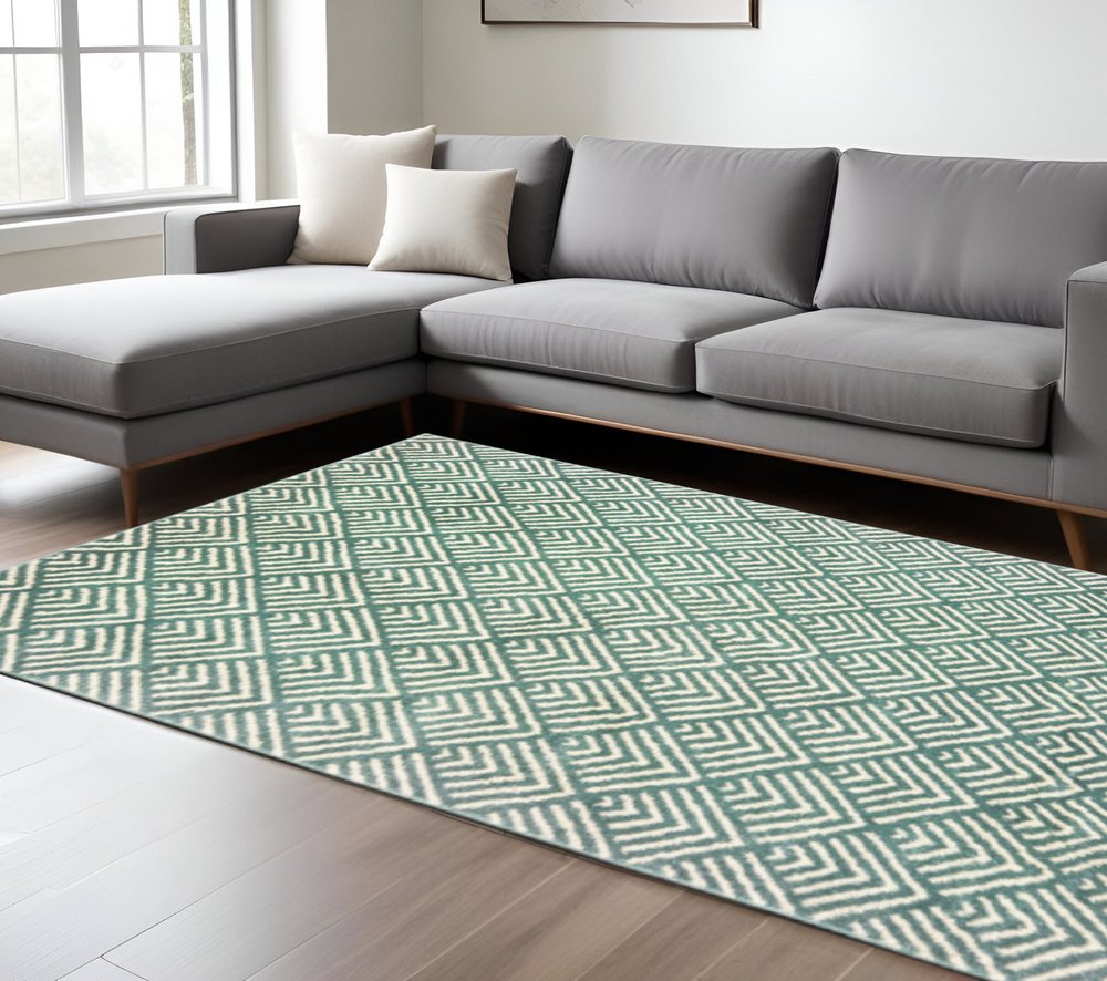 7' X 9' Blue And Ivory Geometric Shag Area Rug