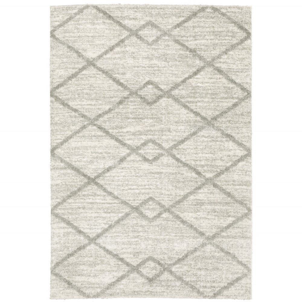 4' X 6' Ivory And Grey Geometric Shag Power Loom Stain Resistant Area Rug