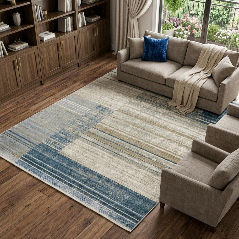 6' X 9' Blue Dark Blue Teal Grey Ivory Beige And Tan Geometric Power Loom Stain Resistant Area Rug With Fringe