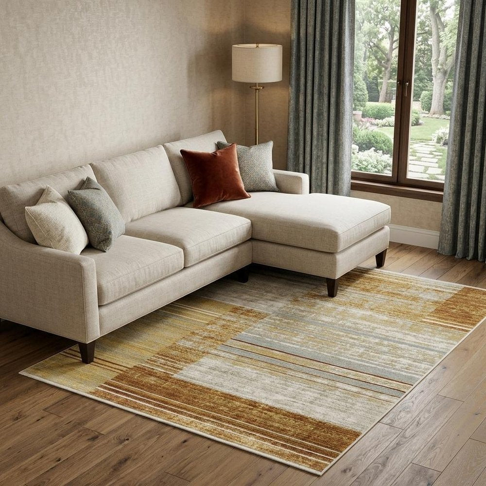 10' X 13' Rust Gold Blue Grey Ivory And Tan Geometric Power Loom Stain Resistant Area Rug With Fringe