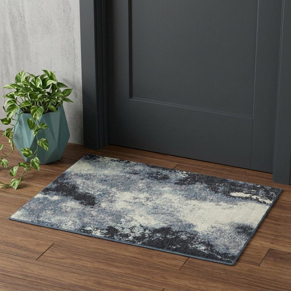 3' X 5' Blue and Ivory Abstract Power Loom Area Rug