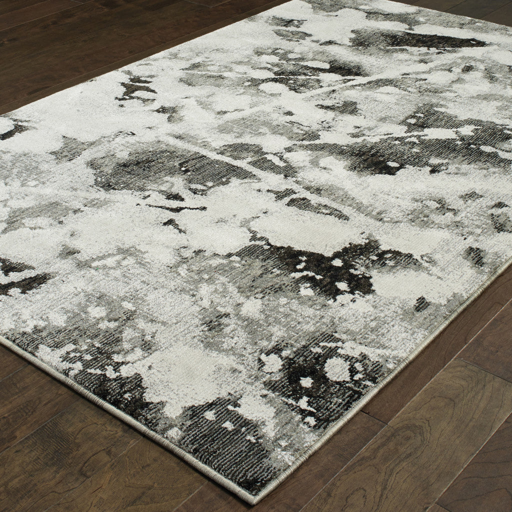 6' X 9' Charcoal And White Abstract Power Loom Stain Resistant Area Rug