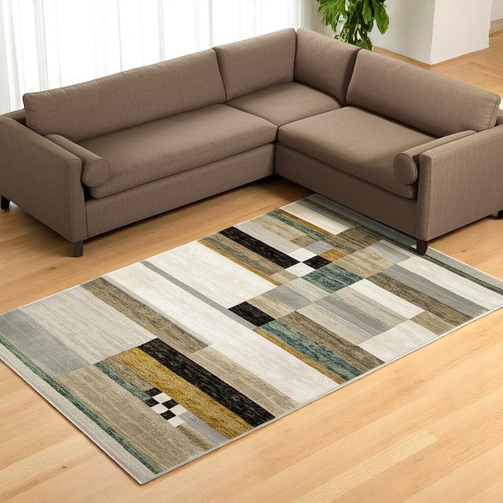 9' X 12' Beige Gold Black Grey Tan Teal and Rust Geometric Power Loom Area Rug