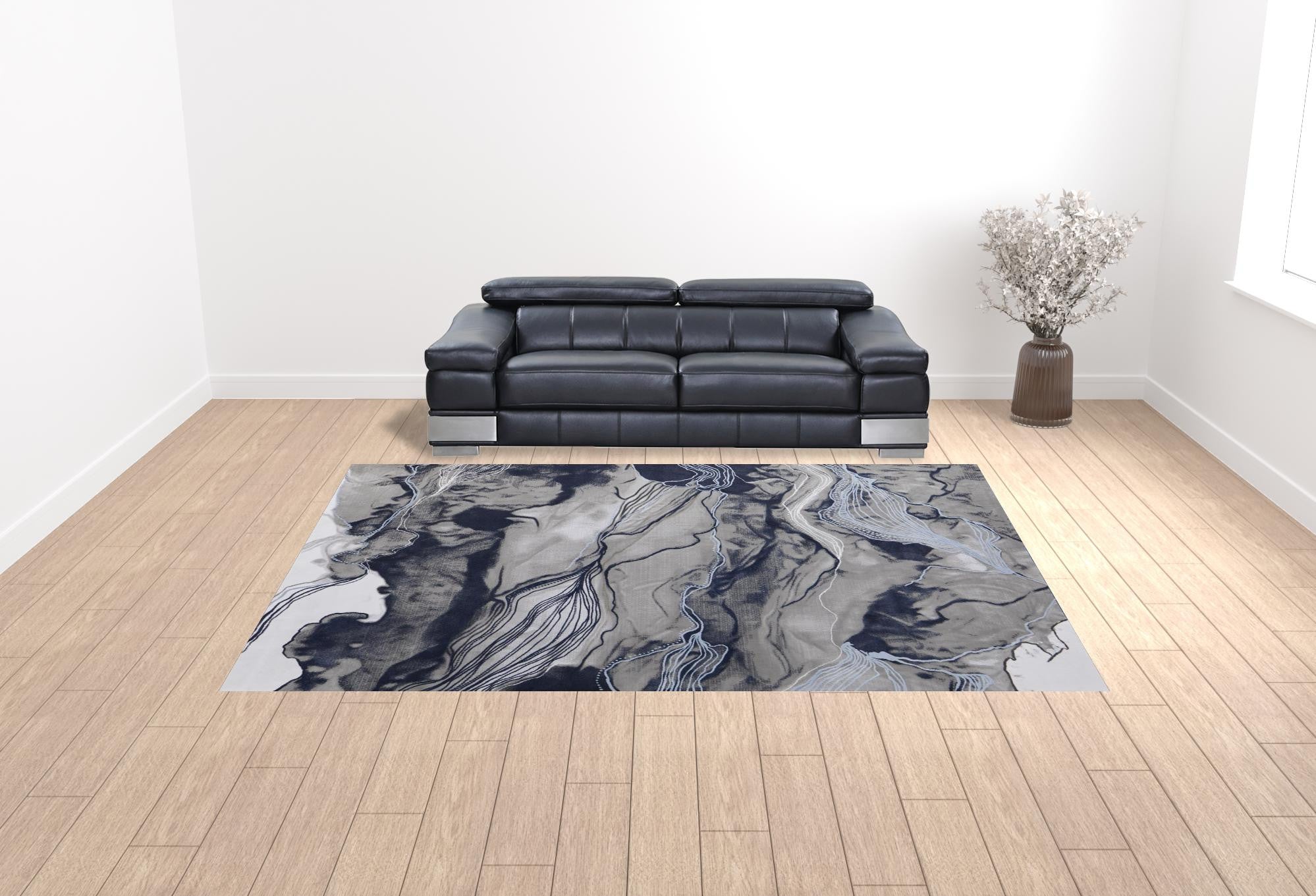 5' X 7' Blue Gray And Ivory Abstract Power Loom Stain Resistant Area Rug