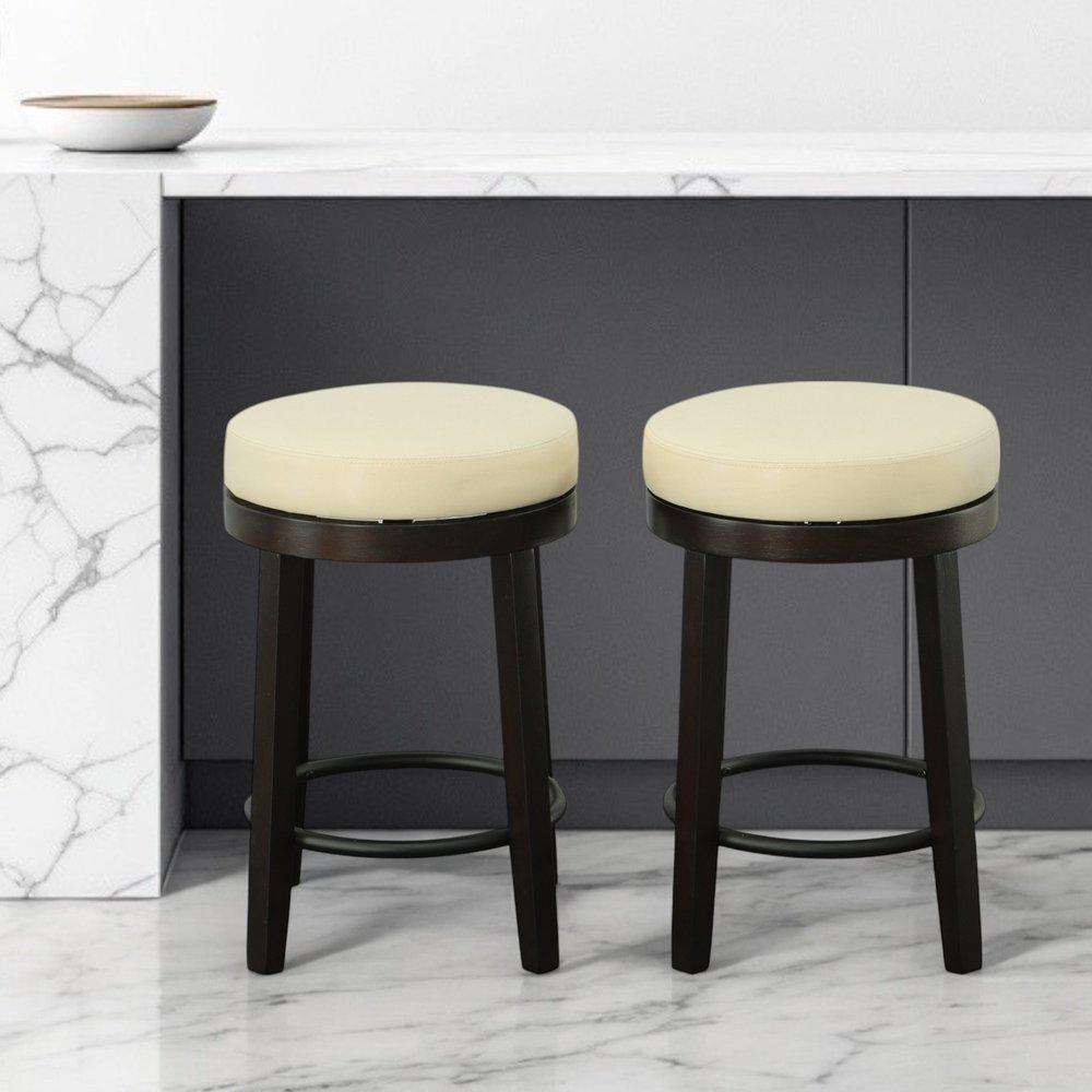 Set of Two 24" Cream and Espresso Faux Leather and Solid Wood Backless Counter Height Swivel Bar Chairs