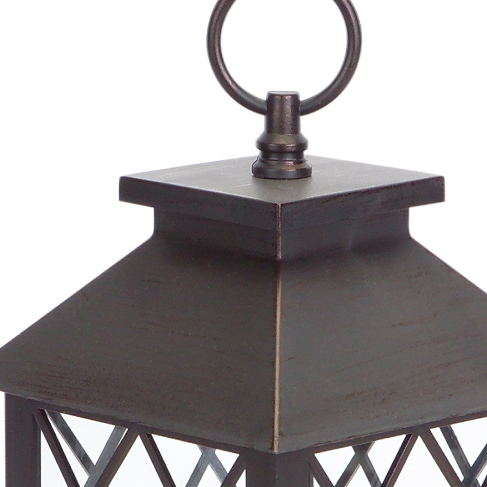 Set of Three Dark Brown Distressed Ornate Glass And Plastic Floor Lantern Candle Holders With Candle