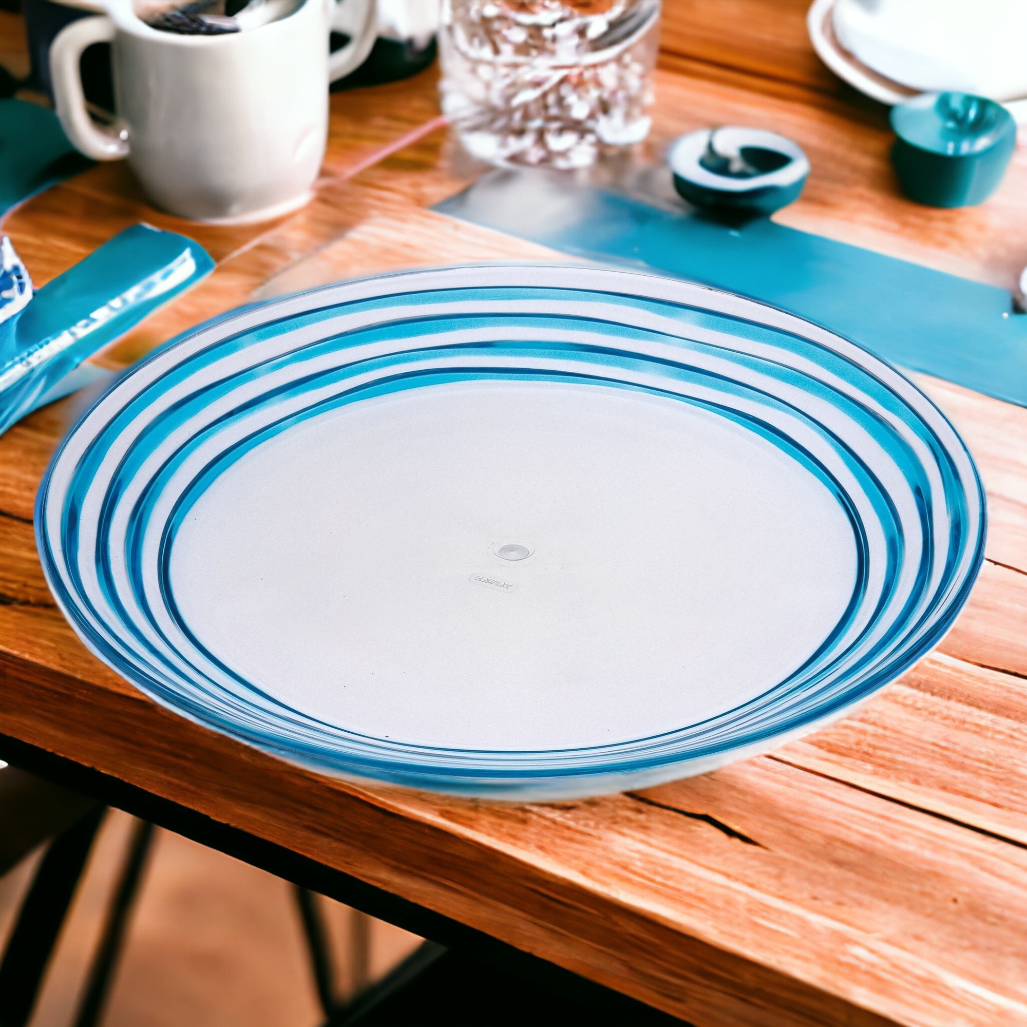 Clear and Blue Four Piece Swirl Acrylic Service For Four Dinner Plate Set