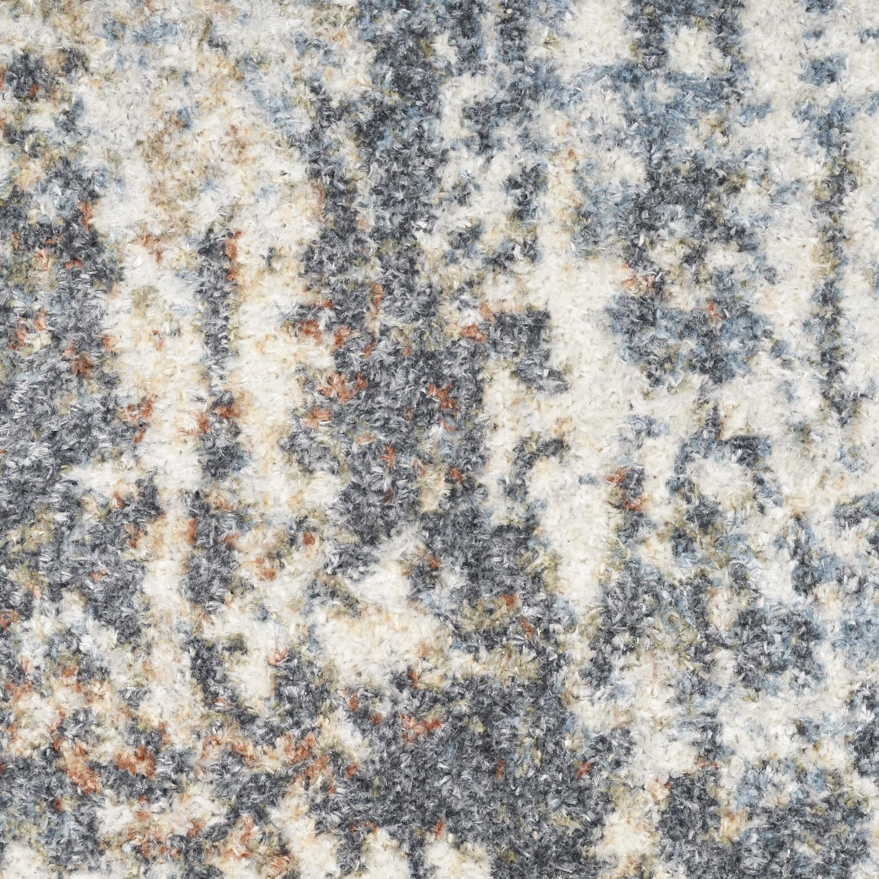 4' X 6' Blue and Ivory Abstract Power Loom Washable Area Rug