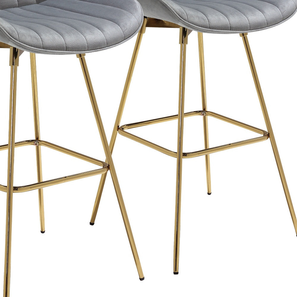Set of Two 29" Gray And Gold Velvet And Metal Low Back Bar Height Swivel Bar Chairs