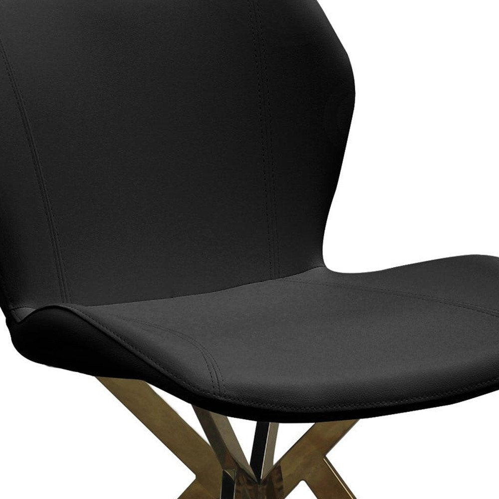 Set of Four Black and Gold Faux Leather Dining Side Chairs