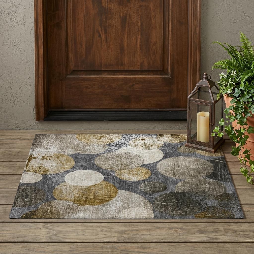 2' X 3' Brown Beige and Ivory Abstract Washable Non Skid Indoor Outdoor Area Rug