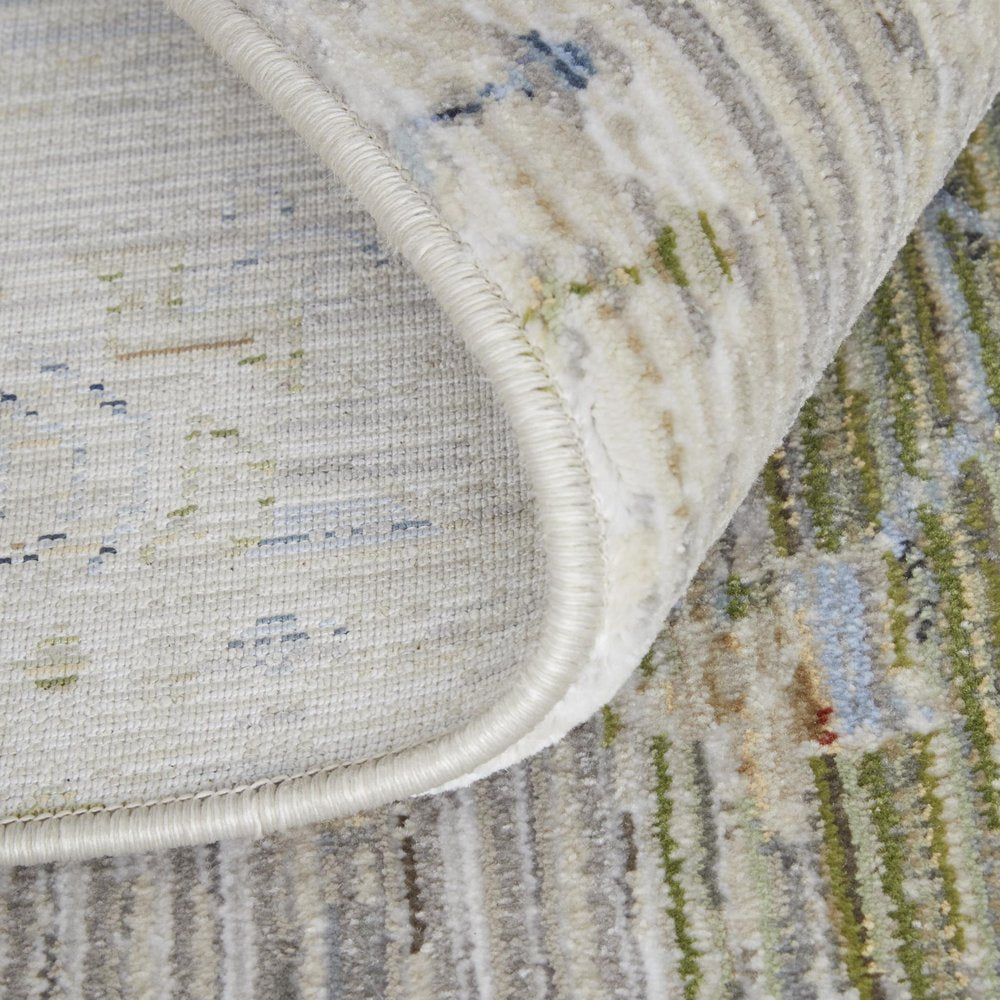 9' X 13' Ivory Green and Blue Abstract Power Loom Worn Faded Area Rug