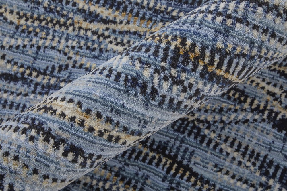 9' X 13' Blue Ivory and Tan Abstract Power Loom Area Rug