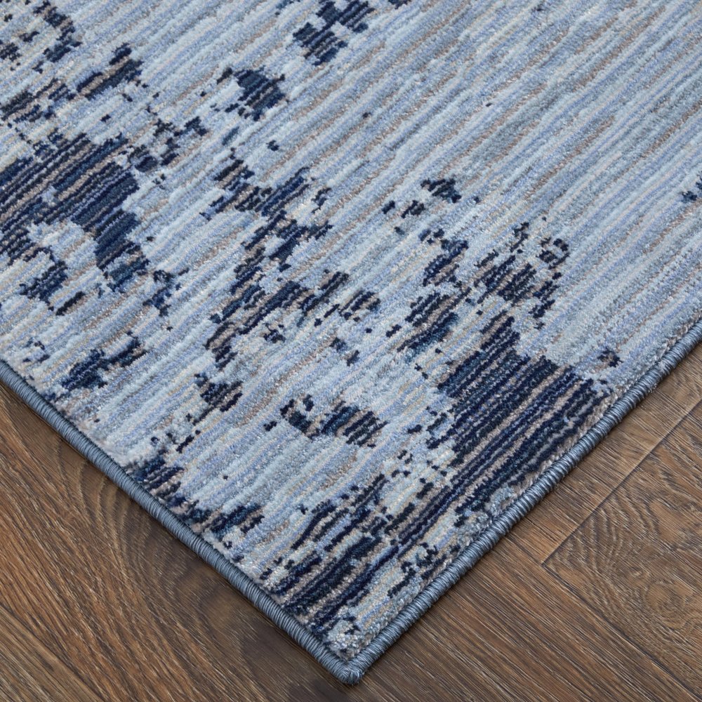 9' X 13' Light Blue and Black Abstract Power Loom Area Rug