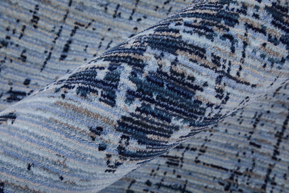 9' X 13' Light Blue and Black Abstract Power Loom Area Rug