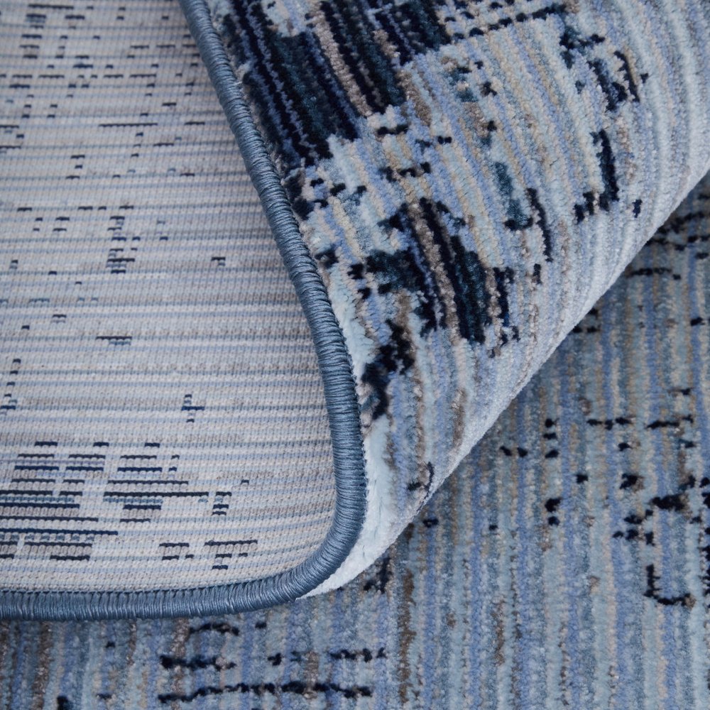 9' X 13' Light Blue and Black Abstract Power Loom Area Rug