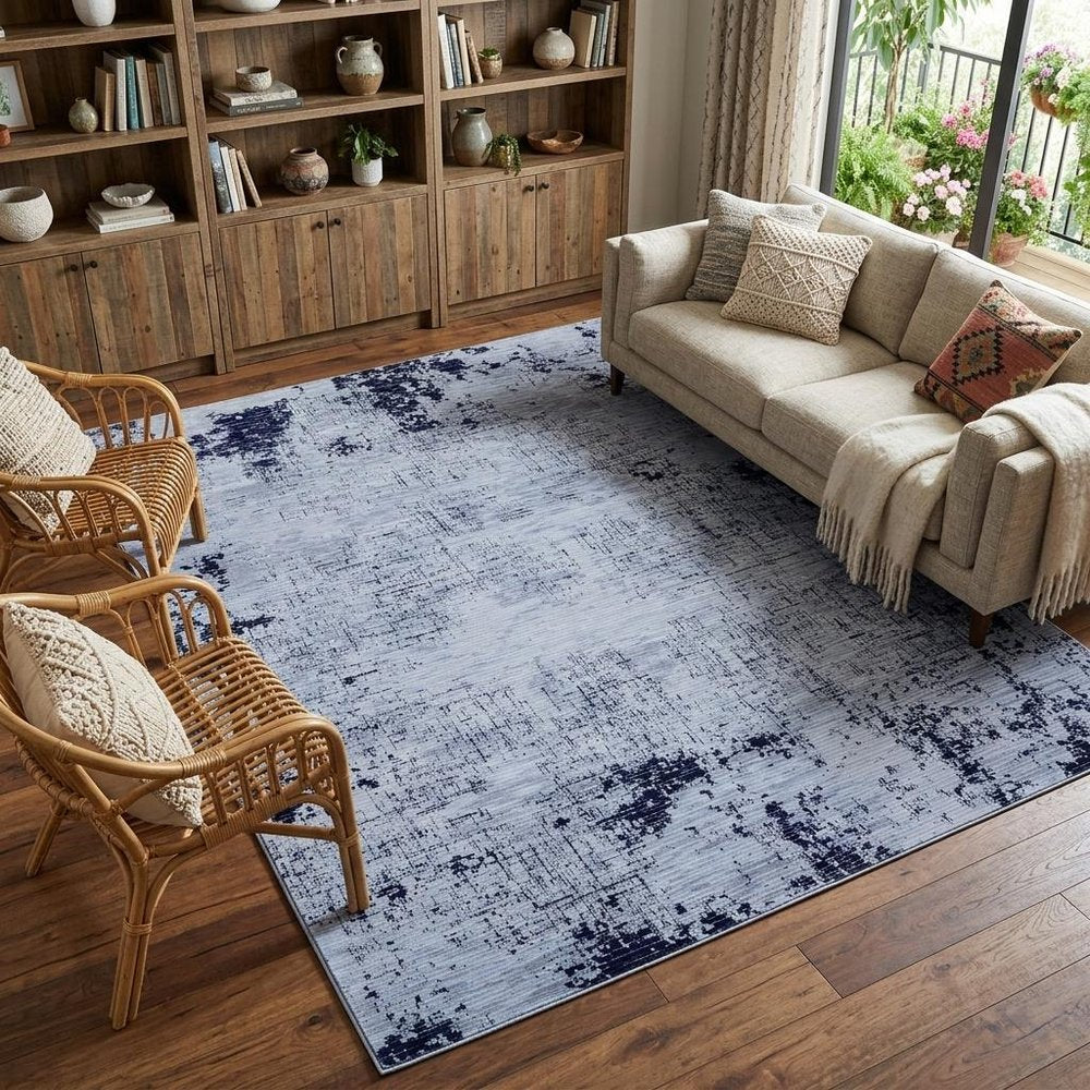 9' X 13' Light Blue and Black Abstract Power Loom Area Rug
