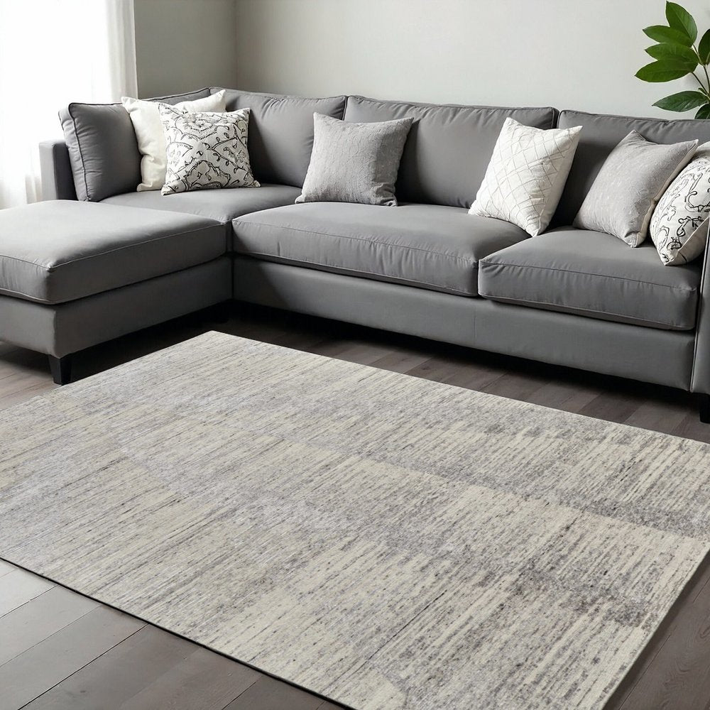 9' X 13' Ivory And Gray Abstract Hand Knotted Distressed Area Rug