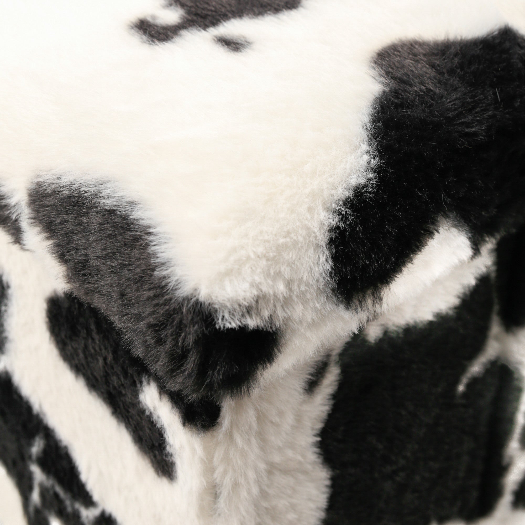 12" Black And White Faux Fur Cow Print Ottoman