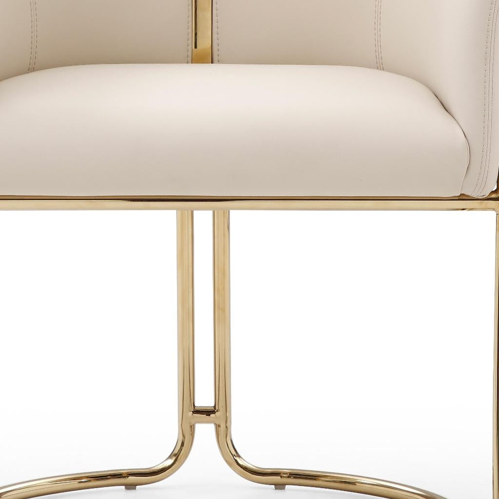 Beige and Gold Faux Leather and Metal Partially Open Back Dining Arm Chair