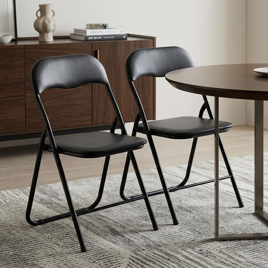 Set of Two Black Faux Leather and Steel Folding Chairs