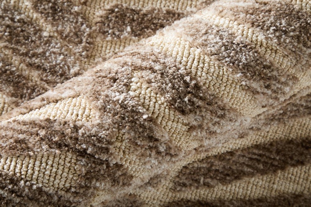 9' X 13' Taupe And Tan Animal Print Area Rug