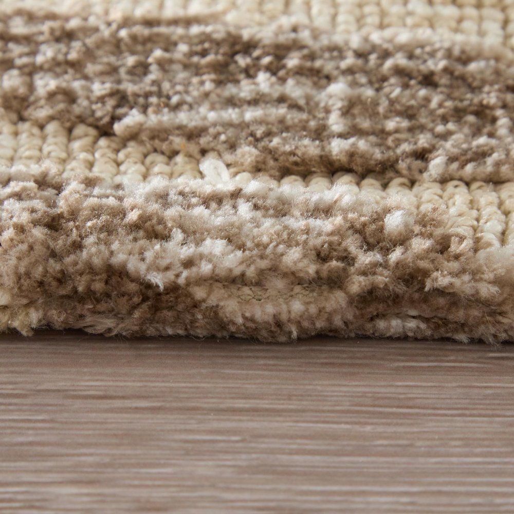 9' X 13' Taupe And Tan Animal Print Area Rug