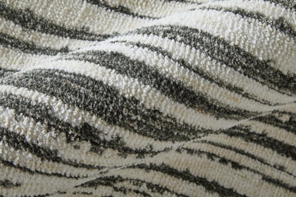 9' X 13' Black And Ivory Abstract Area Rug