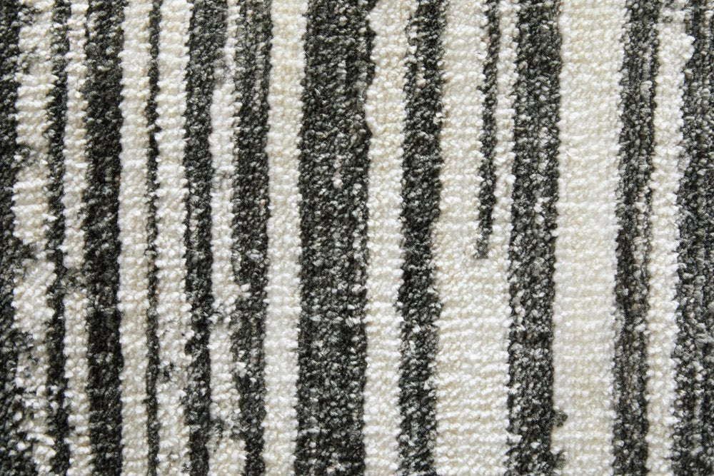 9' X 13' Black And Ivory Abstract Area Rug