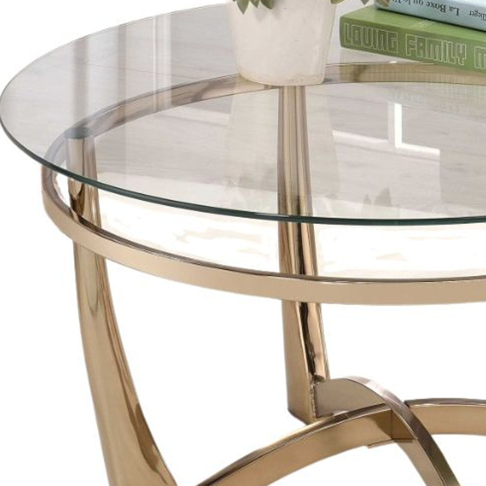 35" Clear And Champagne Glass And Iron Round Coffee Table