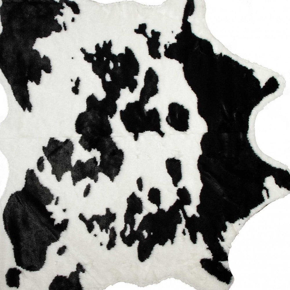 4' X 5' Black And White Faux Cowhide Animal Print Washable Area Rug