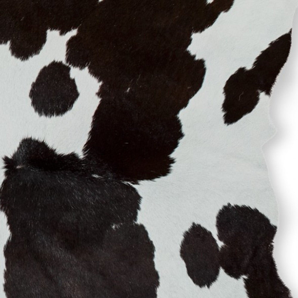 2' X 3' Brown And White Cowhide Abstract Hand Woven Area Rug