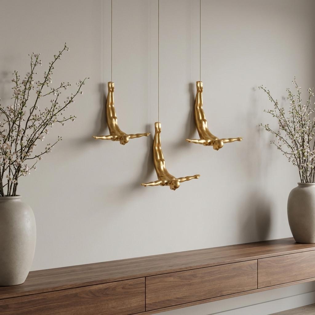 Set of Three Gold Resin Diving Man Hanging Dimensional Sculpture