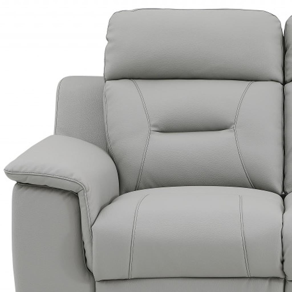 67" Gray And Brown Faux Leather Manual Reclining Loveseat