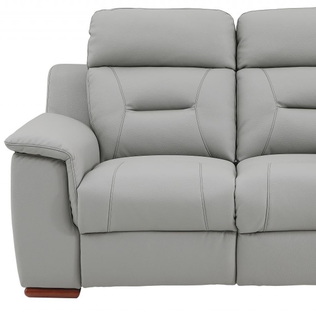 67" Gray And Brown Faux Leather Manual Reclining Loveseat
