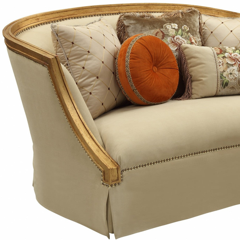 70" Tan And Gold Polyester Blend Curved Loveseat and Toss Pillows