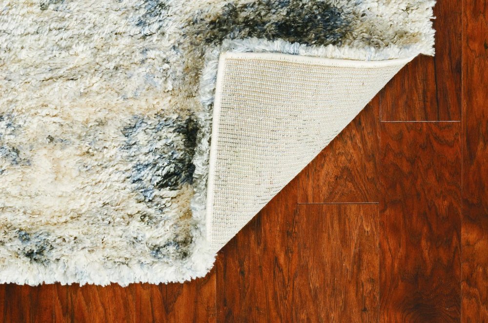 8' X 10' Ivory And Blue Abstract Area Rug